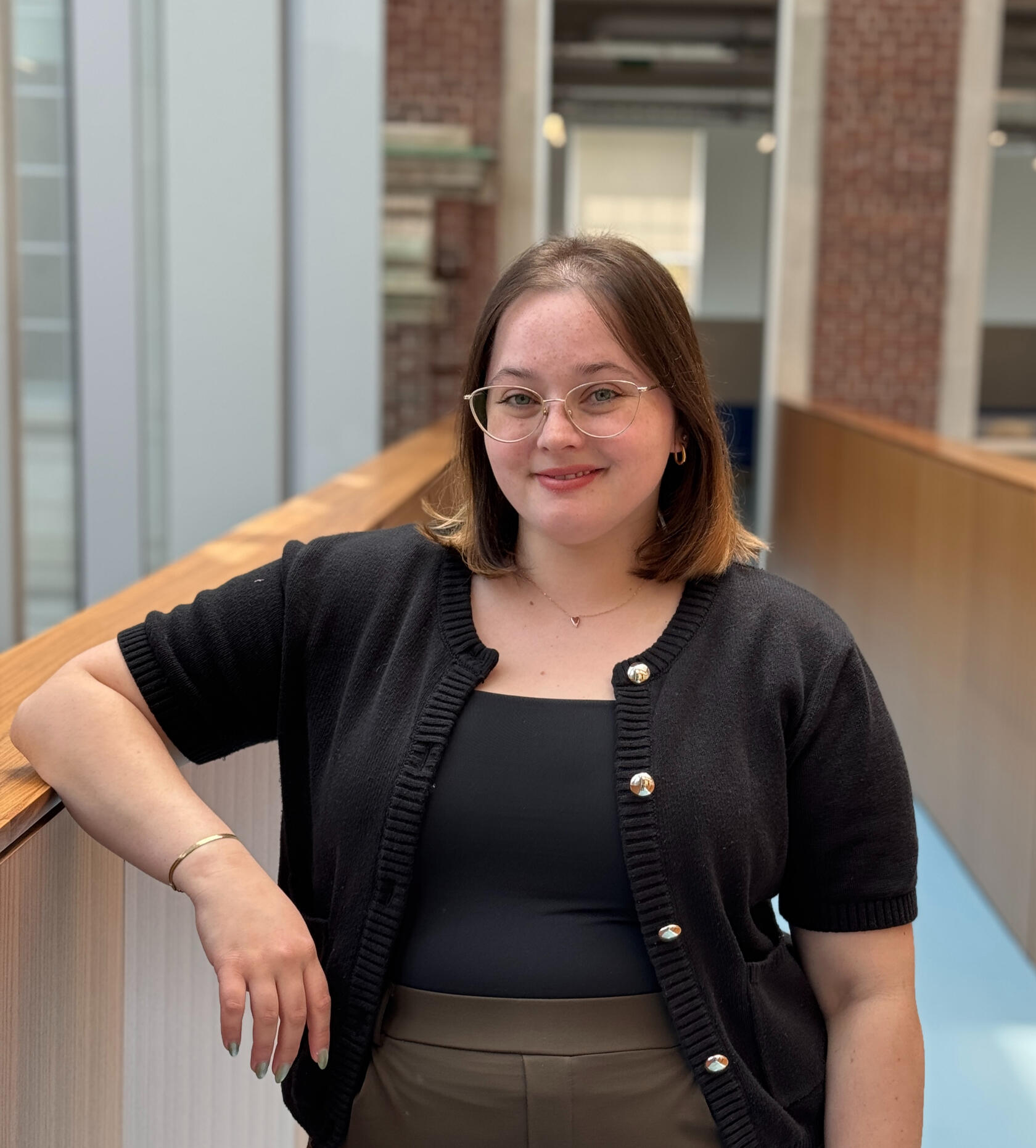 Headshot of Ashley, she is smiling at the camera.