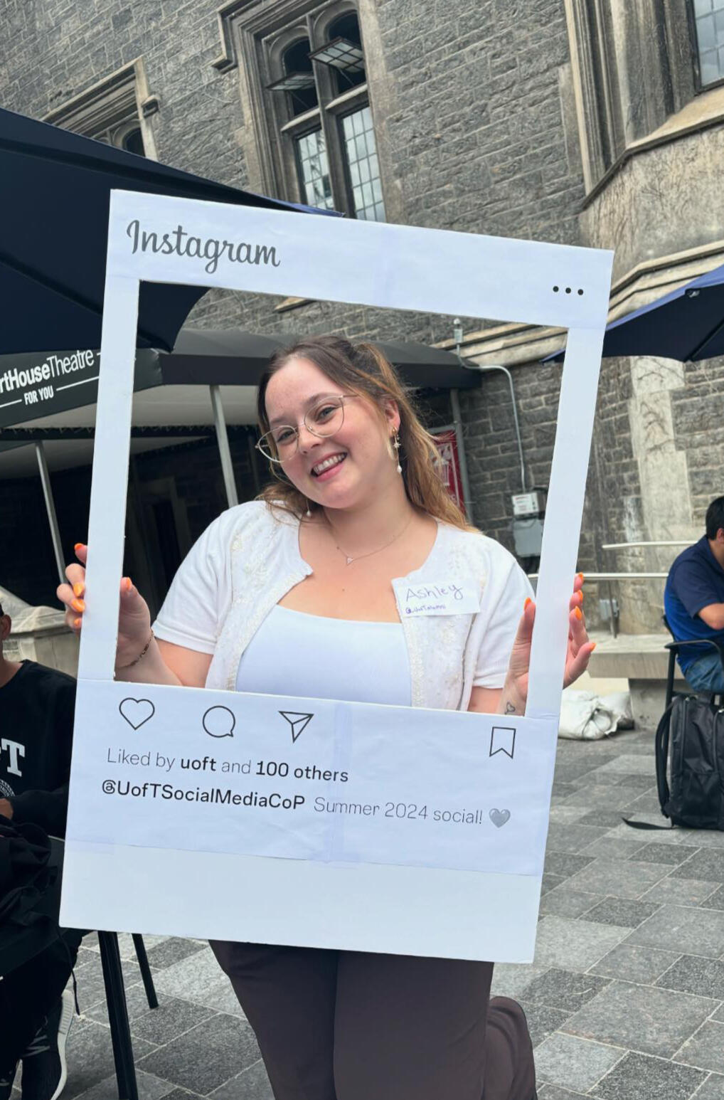 Headshot of Ashley, she is smiling at the camera.
